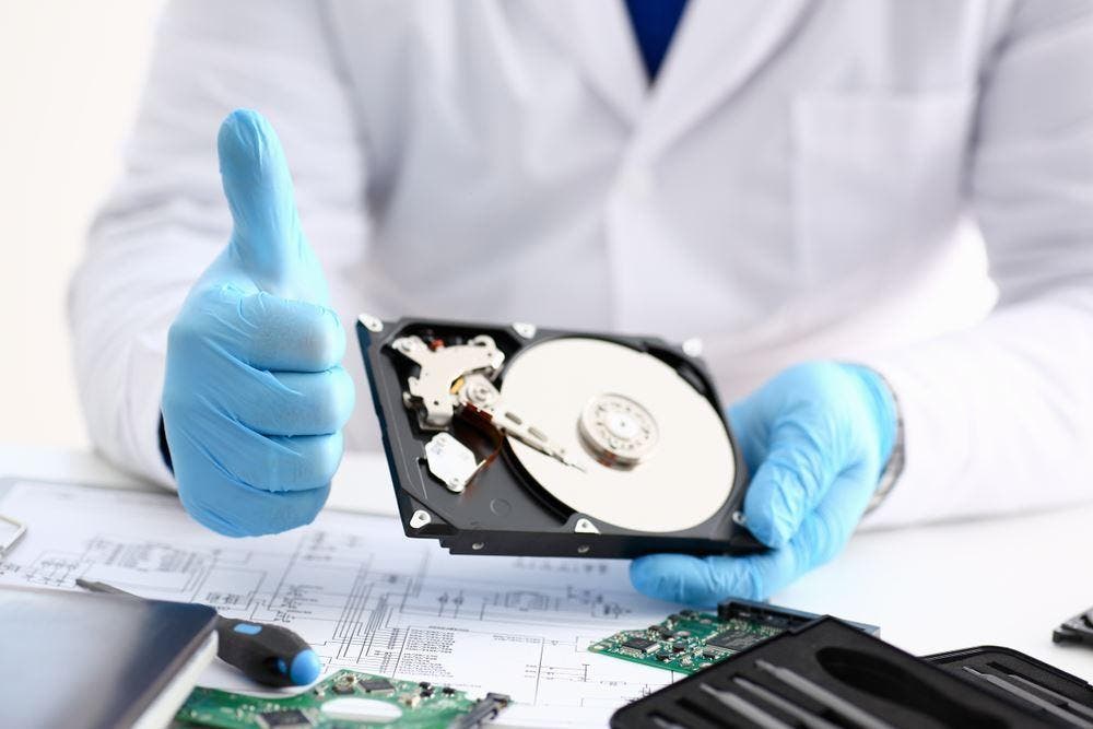 Technician working on a HDD